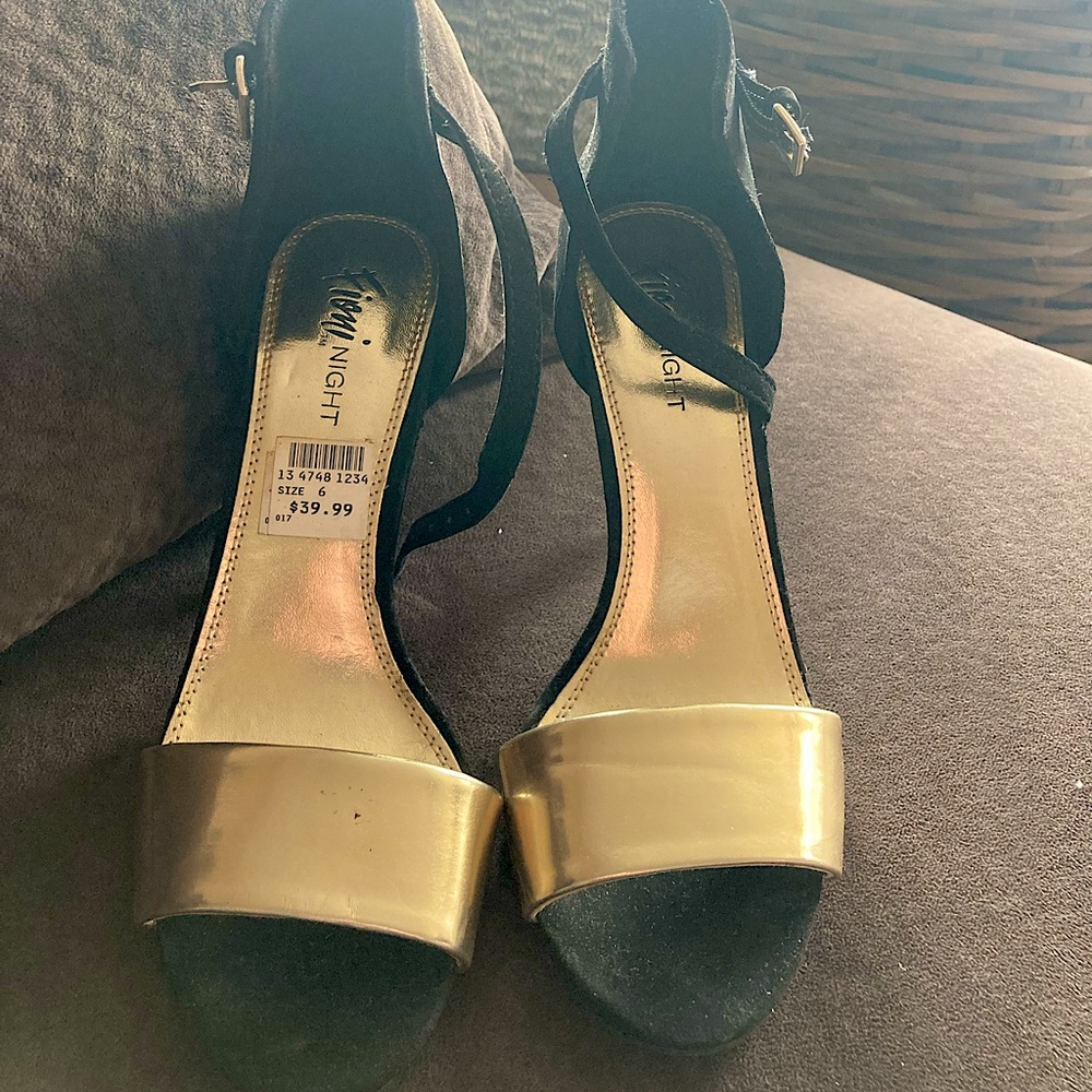 Black and gold high heels